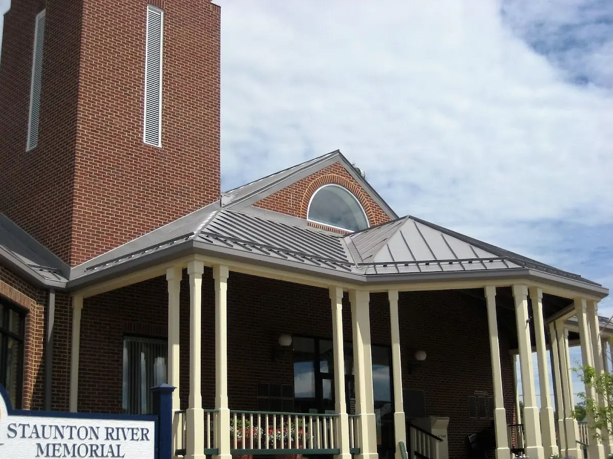 Skilled roofing craftsmen working on a residential roof in Shadetown